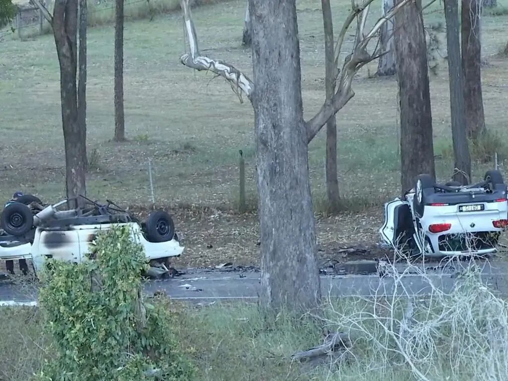 Both vehicles overturned in the horror crash. Picture: 7News