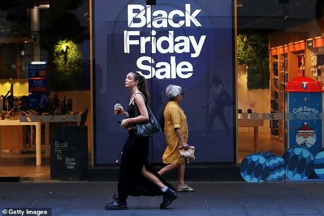 Parts of Australia's economy were doing very well but the majority was under pressure, Mr Lew added. Above, an ad for the Black Friday sales last week